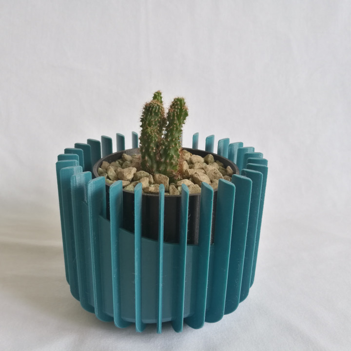 Self-watering plant pot image