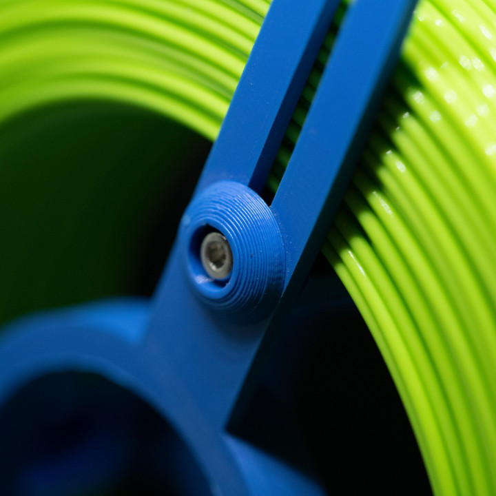 Reusable adjustable spool for spoolless filament image