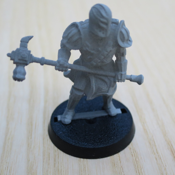 3D Printable Cleric Adventurer with Warhammer by Medusa Miniatures