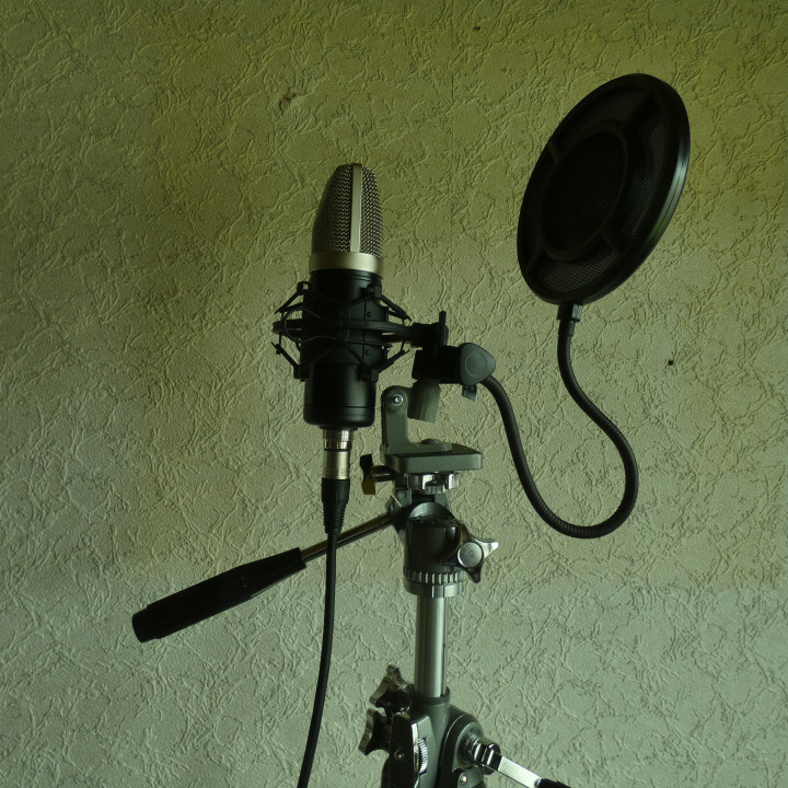 Adaptor photo tripod to microphone holder thread image