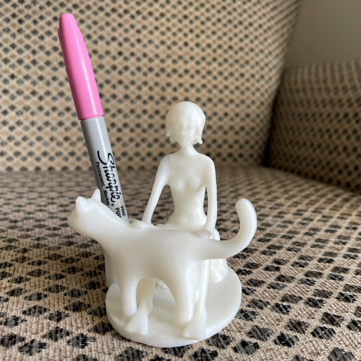 Girl and cat pen holder image