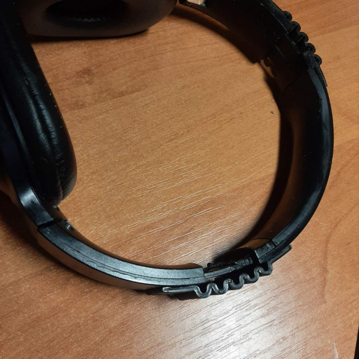Repair holder for headhones image
