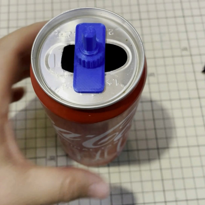 Electric drill accessory (fix the top part of a soda can) image