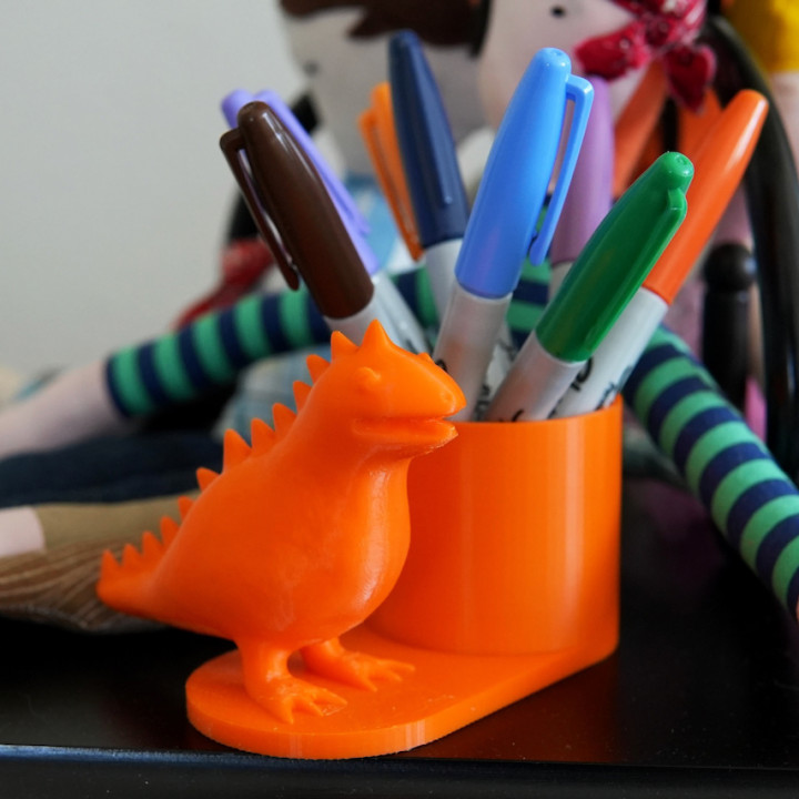 Friendly dinosaur pen holder image