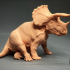 Triceratops resting dinosaur print image