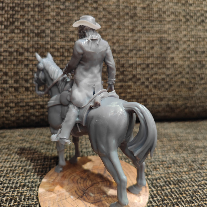 Old Cowboy on horseback image
