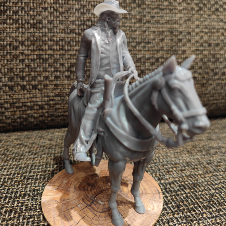 Old Cowboy on horseback image