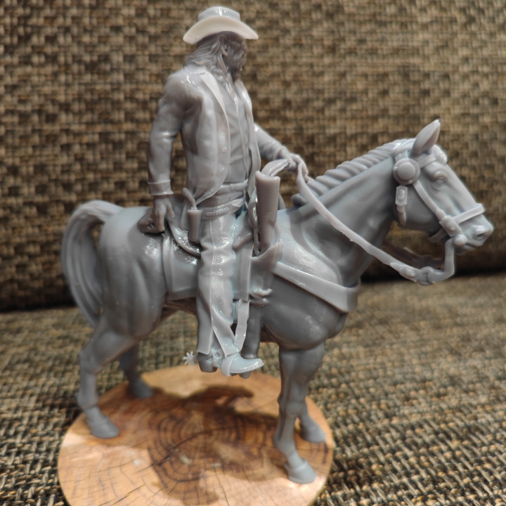 Old Cowboy on horseback image