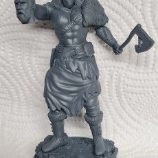 Picture of print of Bare-chested viking warrior with axe and severed head (2) - Alkemy Lord of the Rings War of the Rose Warcrow Saga