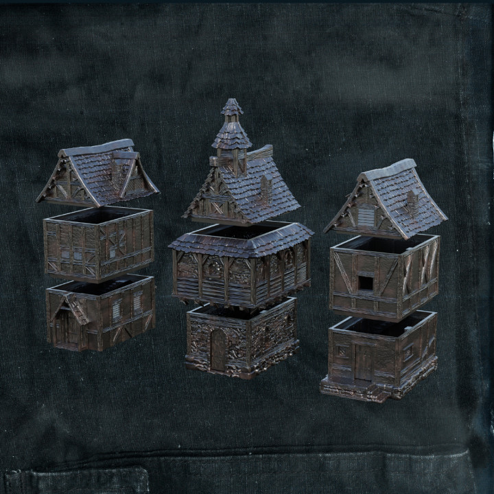 Three different medieval houses image