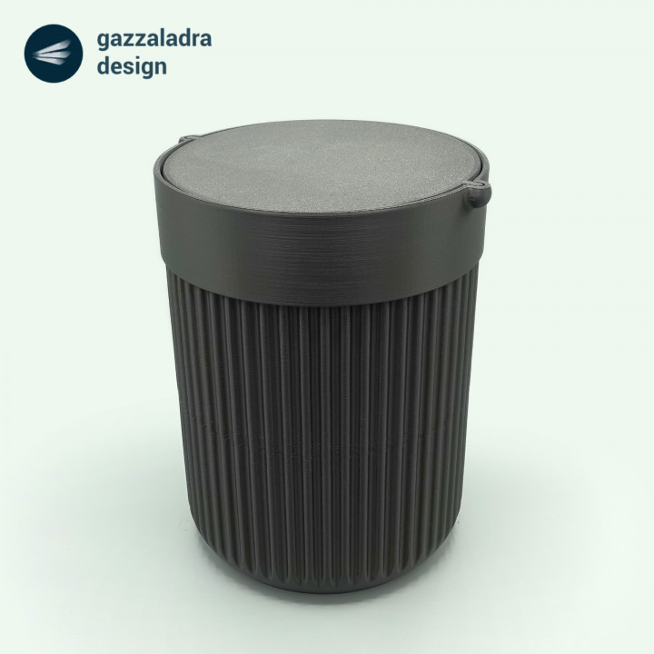 Trash can with swing lid image
