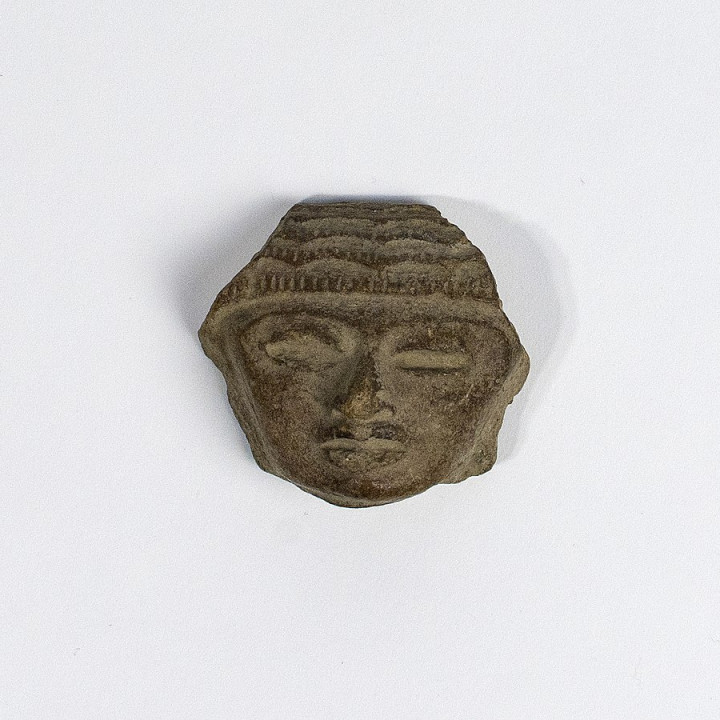 Stone head of a figurine image