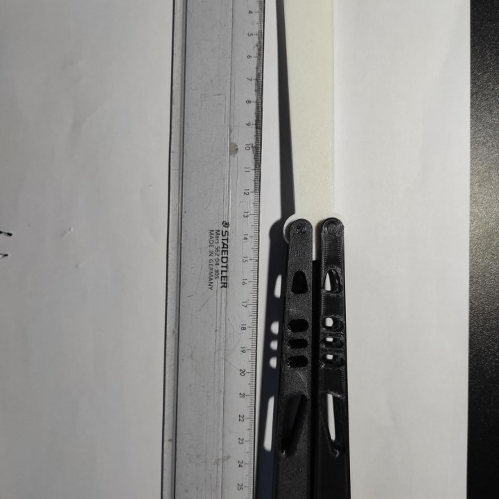 Butterfly training knife. (easy to do)