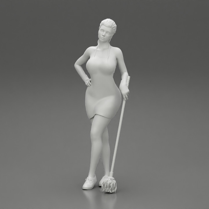 Tired Housewife Holding Mop While Standing image