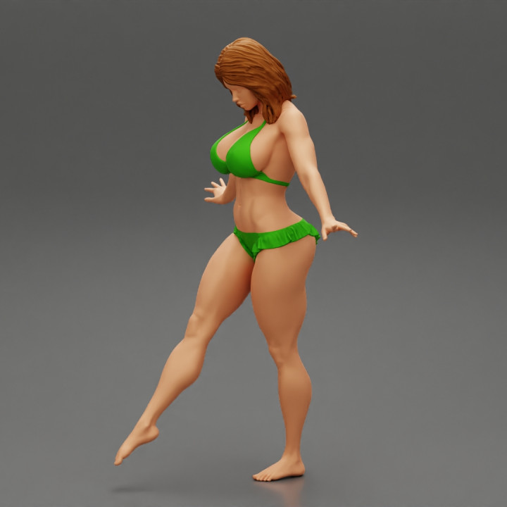 Pretty Bikini Model Standing On One image