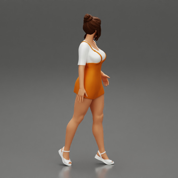 Sensual Girl walking in Denim Overall image