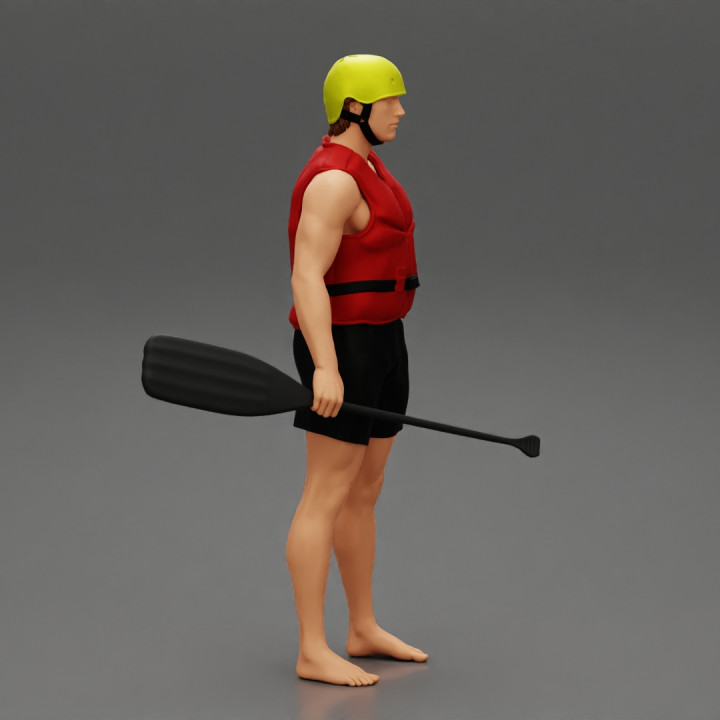 man in rafting outfit standing image