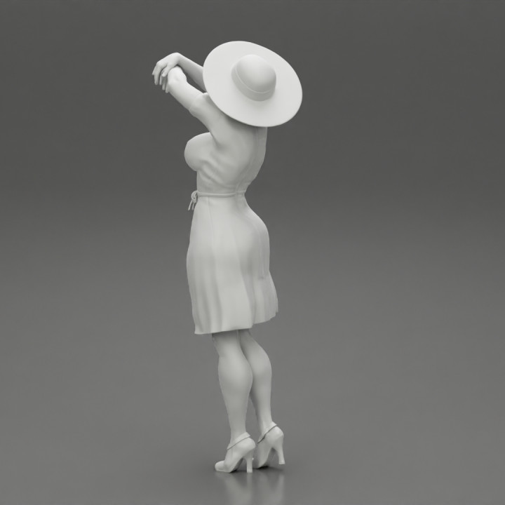 Elegant woman in hat modern style fashion posing