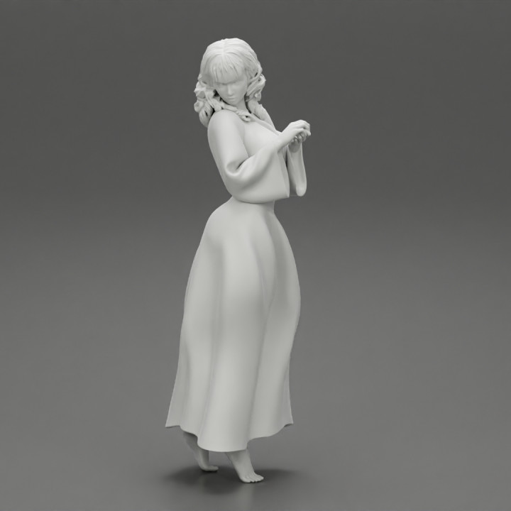 Fashion woman standing in long dress back turned and looking over his shoulder