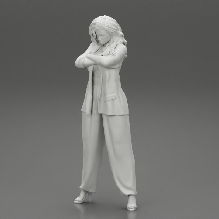 Businesswoman Standing With Crossed Hands