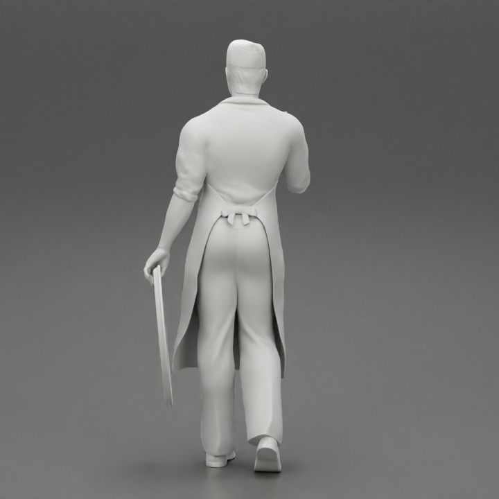 Waiter carrying an empty tray