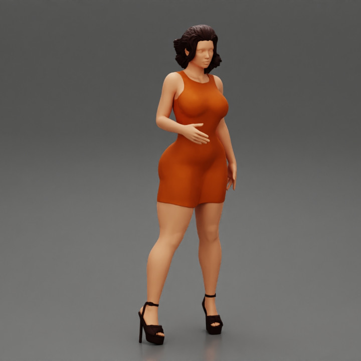 Beautiful Woman Mini Dress and high heels Posing image