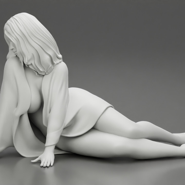 Beautiful half nude woman lying wearing cover image