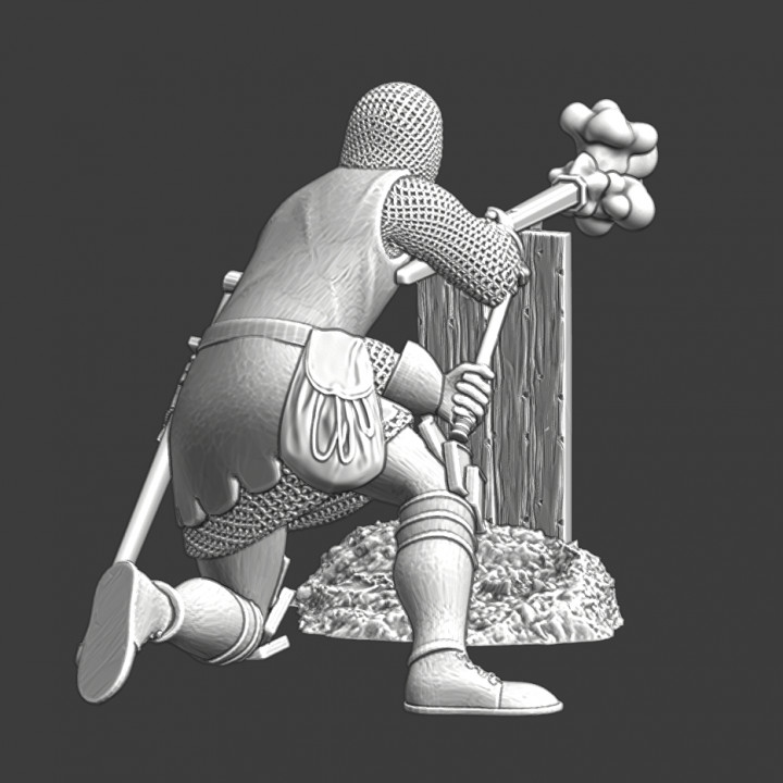 Medieval handgunner firing his weapon image