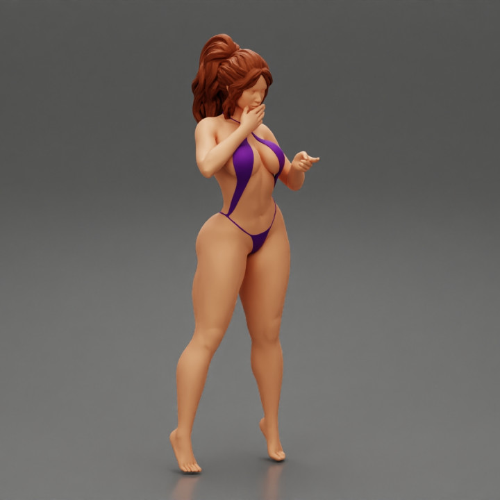 Sexy Woman in  Micro Bikini Bra Mini Thong Slingshot image
