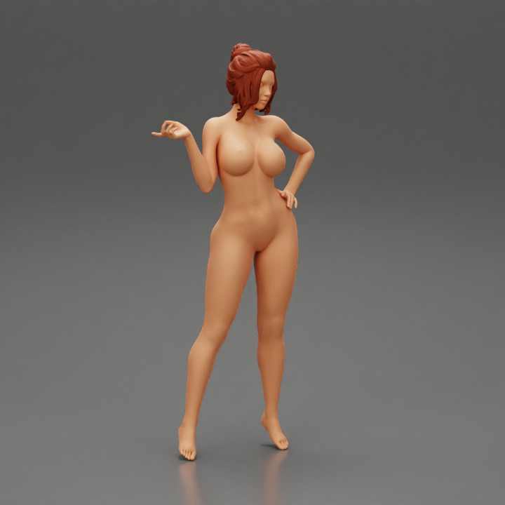 Naked girl standing and put hand on hip image