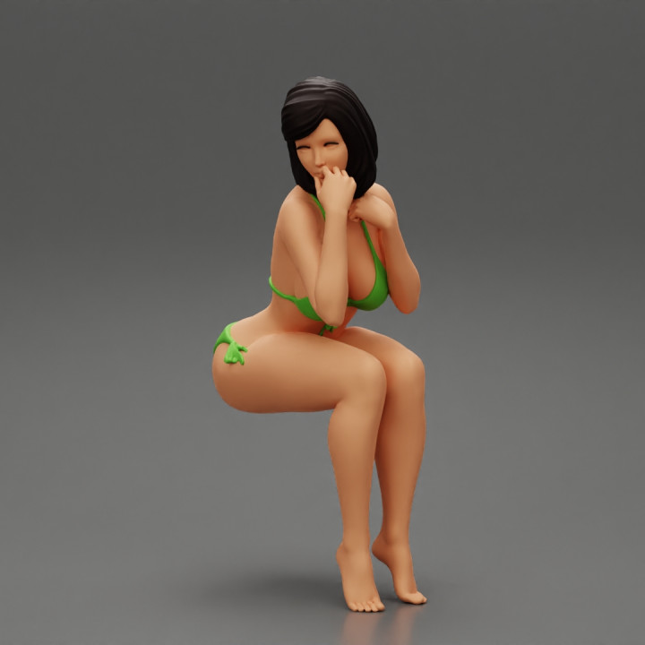 Sexy girl in bikini sitting image