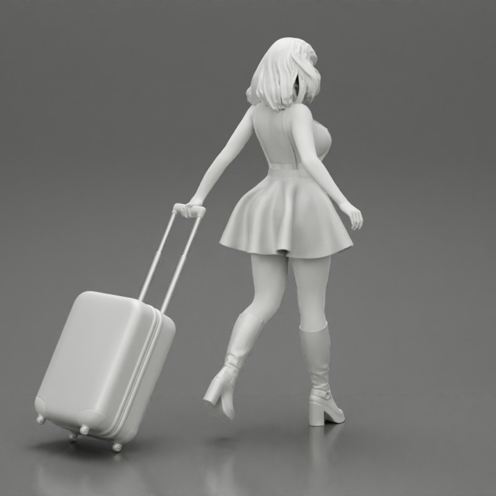 2 Young woman in sexy dress and boots pulling suitcase  walking in airport terminal image