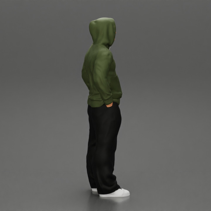 2 Gangster homie in hoodie standing with hands in pockets image