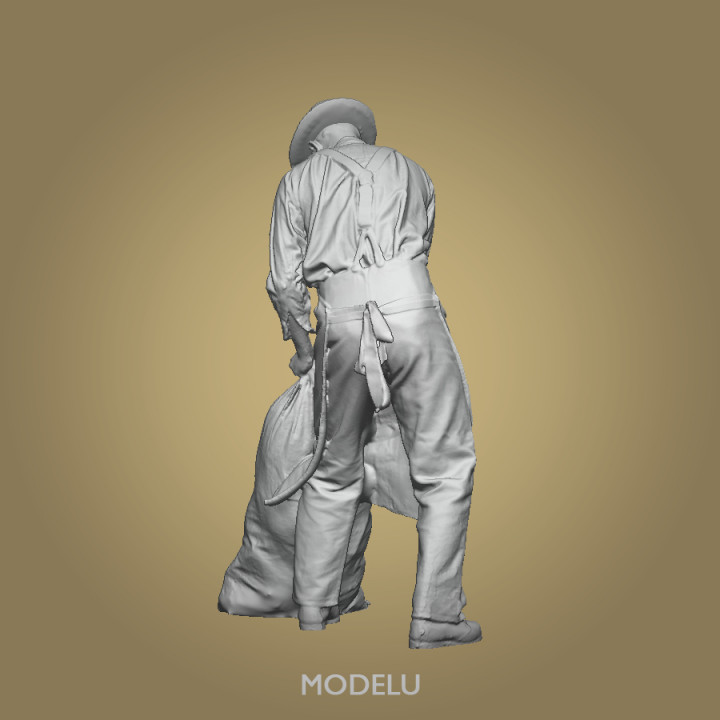Workman moving sack