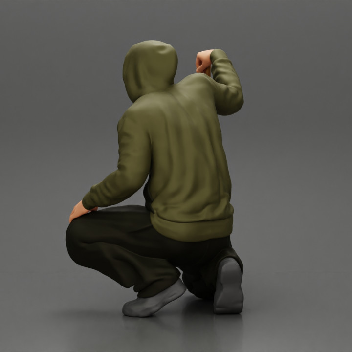 3d Printable Gangster Homie In Hoodie Sitting Holding A Baseball Bat By 3dgeschaft Miniatures 8651