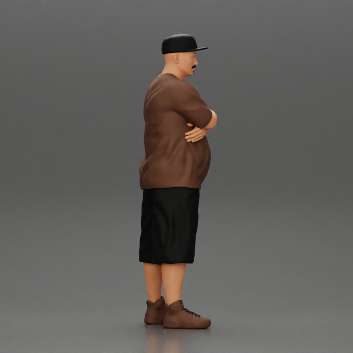 Fat Gangster in cap folding one's arms image