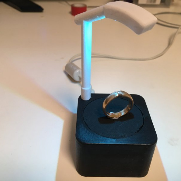 Rotating display with light for miniatures/jewelry image