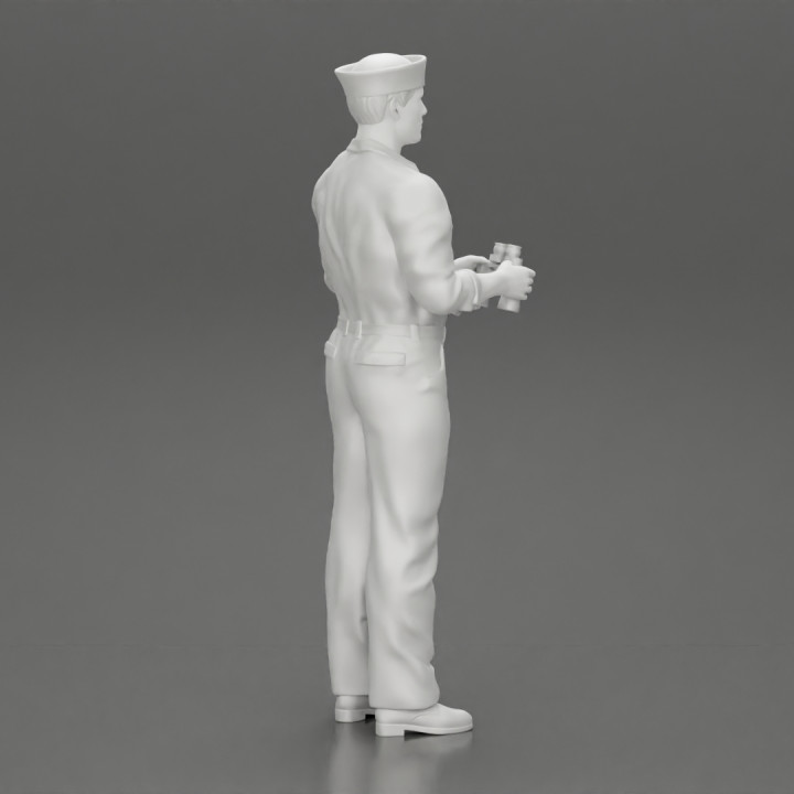 navy holding binoculars