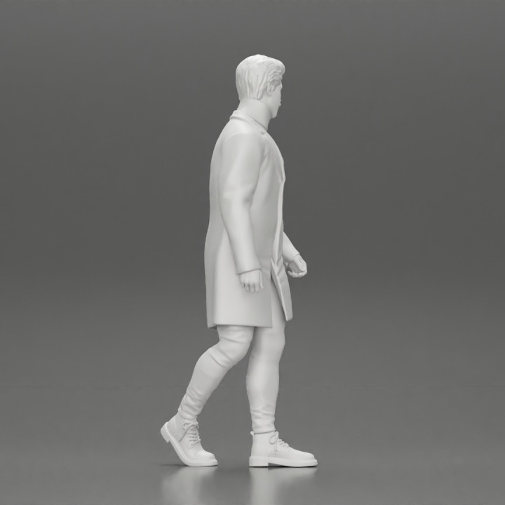 Stylish Man Walking Wearing Coat Over a Turtleneck image