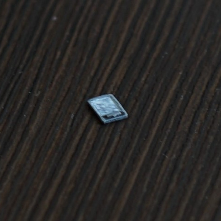 Small tablet in scale image