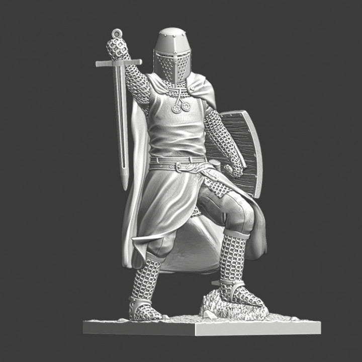 Medieval Crusader Knight praying with sword image