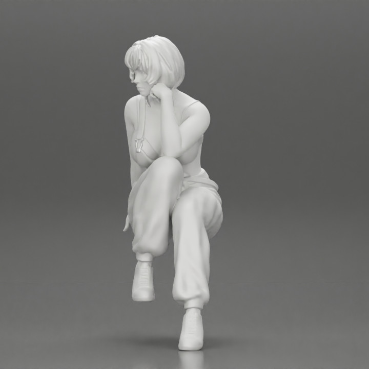 3d Printable Young Woman Sitting Taking Off Her Bib Overalls By