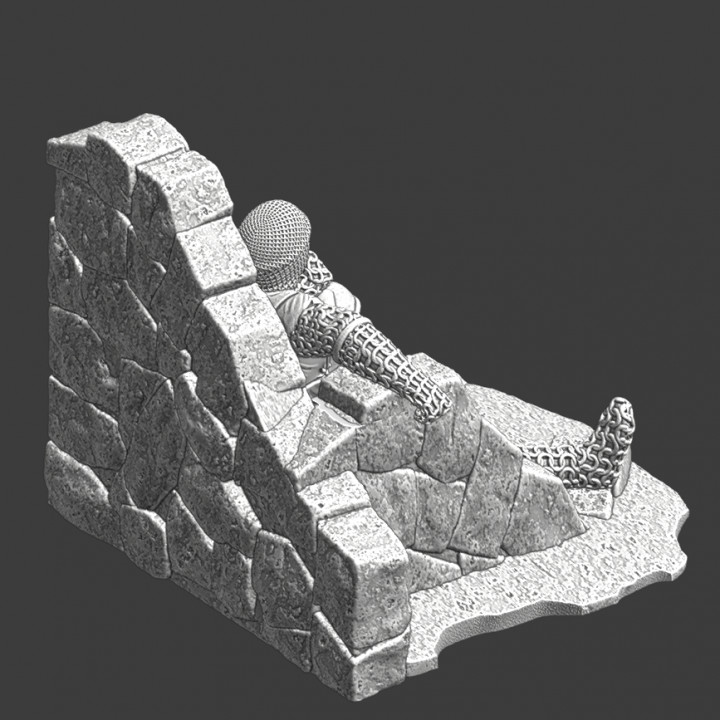 Wounded knight lying wounded in small ruin image