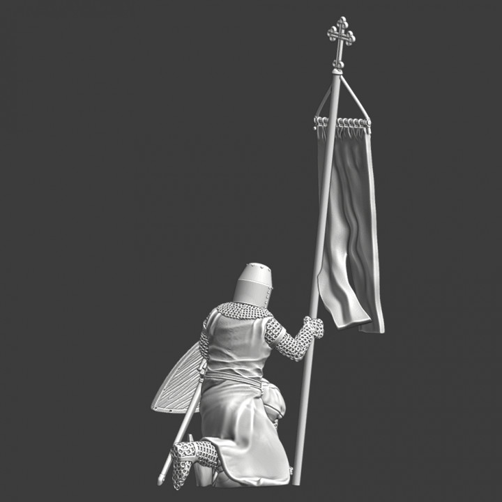 Medieval Knight kneeling with crusader banner image