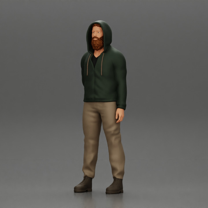 bearded man stands confidently, adorned in a stylish hoodie image