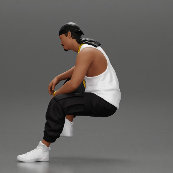 gangster homie in a gold chain and durag is sitting and thinking image