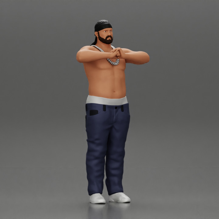 Gangster homie in a silver chain and durag standing
