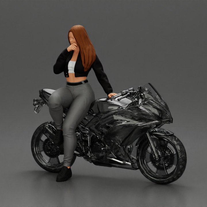 Beautiful girl in sunglasses and  mini jacket sitting on the motorbike image
