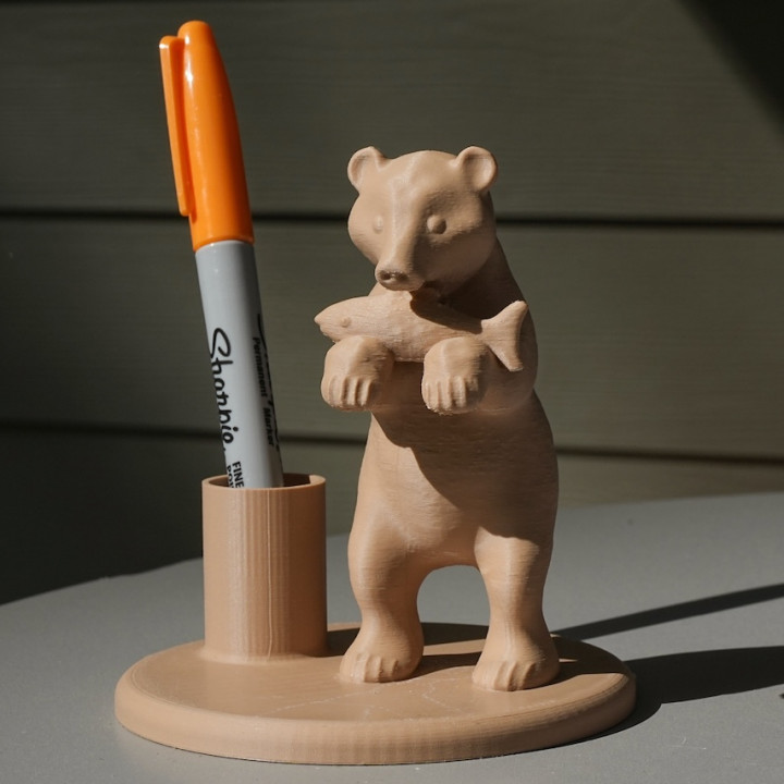 Bear with fish pen holder