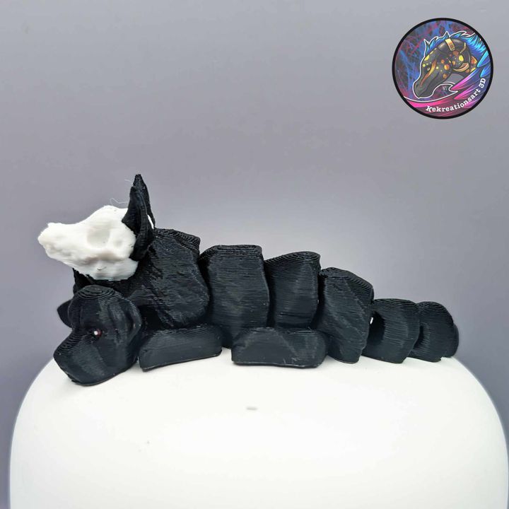 3D Printable Baby Flexi Cerberus Keychain by Kirsten M